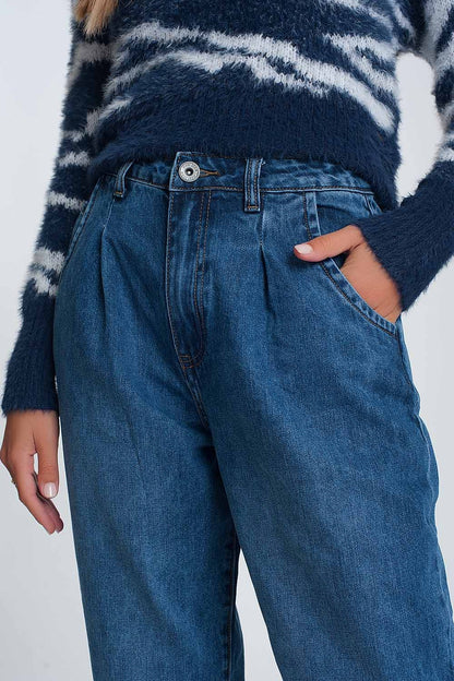 Vaqueros mom de talle alto con dos volantes en la cintura en azul lavado oscuro