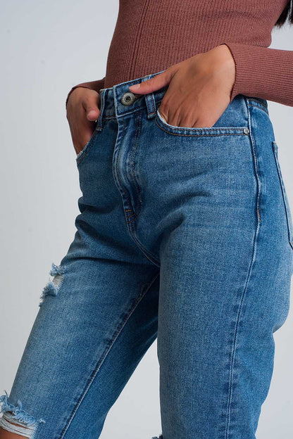 Vaqueros mom de talle alto con rodillas rotas en azul oscuro lavado