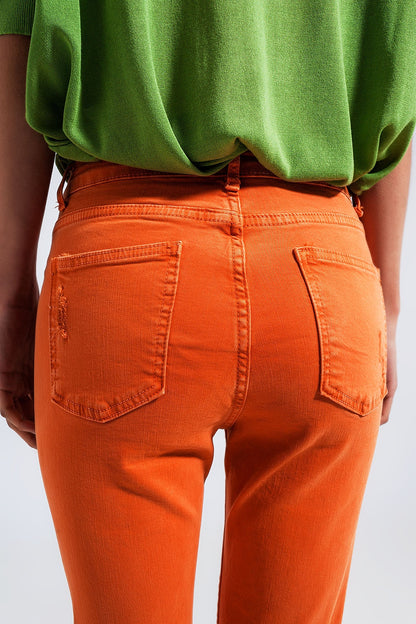 Vaqueros naranja de talle alto y corte pitillo