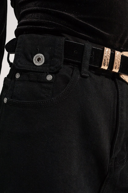 Vaqueros negros con detalle de bolsillos