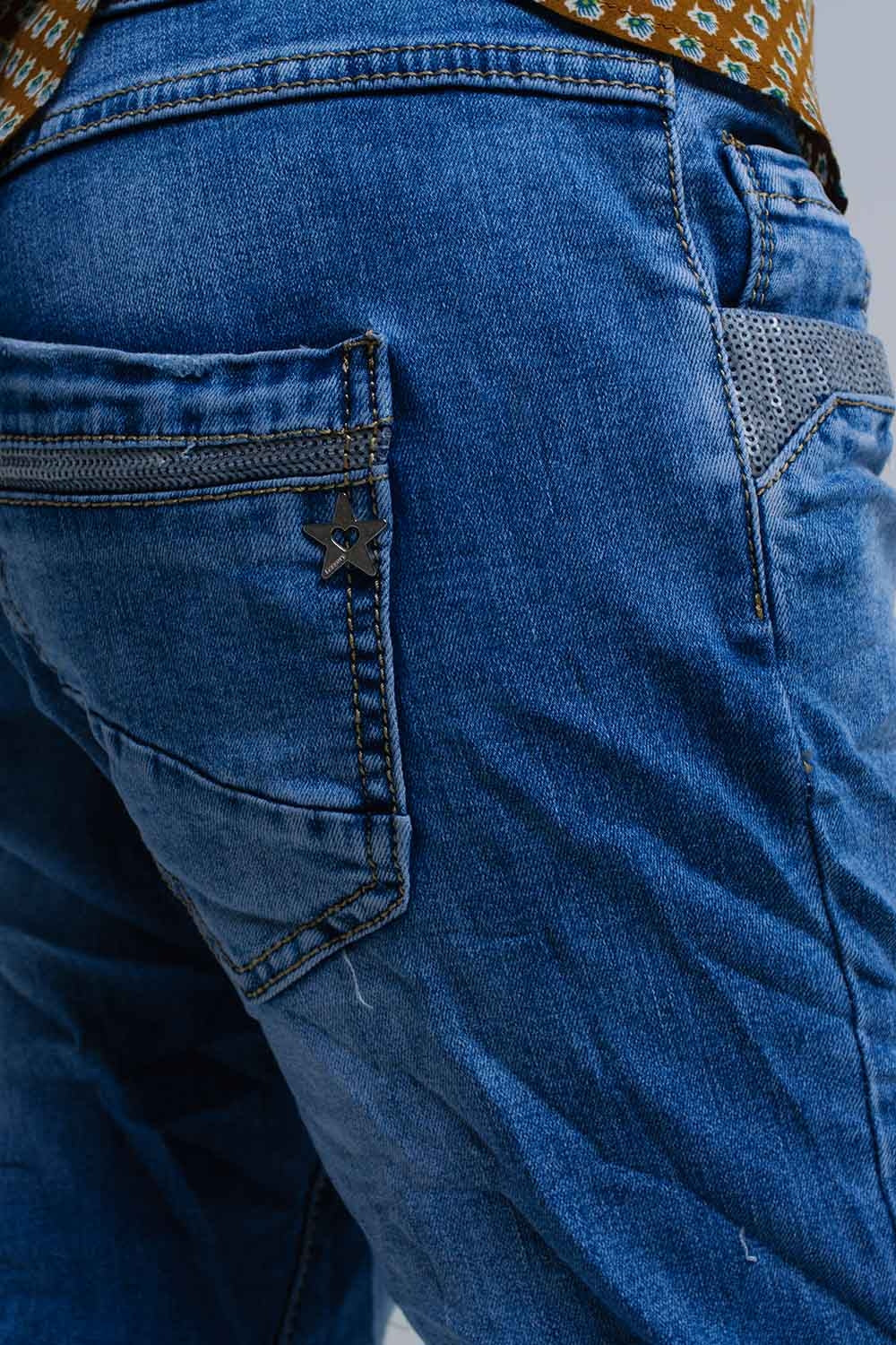 Vaqueros pitillo azules con detalles de lentejuelas