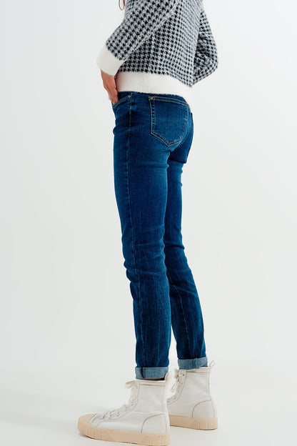 Vaqueros pitillo con lavado azul medio de talle alto