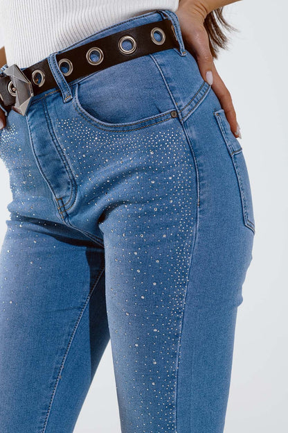 Vaqueros pitillo en azul lavado con strass en toda la parte delantera