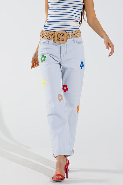 Vaqueros relajados blanqueados con diseño floral multicolor