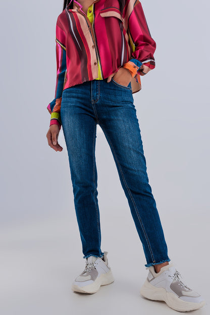 Vaqueros skinny de cintura alta con bajos sin rematar en azul oscuro