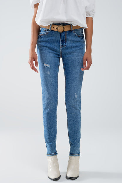 Q2 Vaqueros super ajustados en denim elástico con detalles desgastados