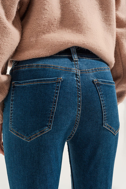 Vaqueros super skinny con lavado azul medio