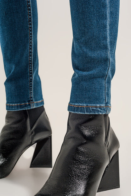 Vaqueros super skinny con lavado azul medio