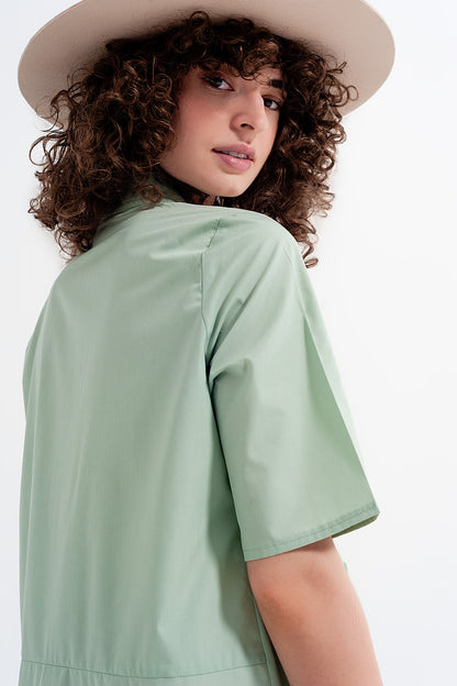 Vestido amplio corto en color verde a capas