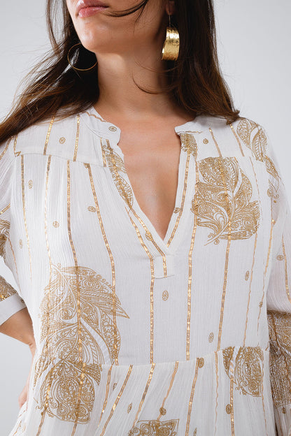 Vestido boho de manga larga con estampado de hojas y detalles de lúrex en blanco