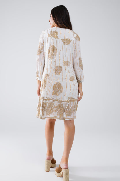 Vestido boho de manga larga con estampado de hojas y detalles de lúrex en blanco