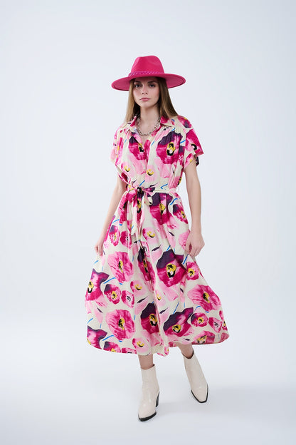 Vestido camisero abotonado con estampado floral en fucsia