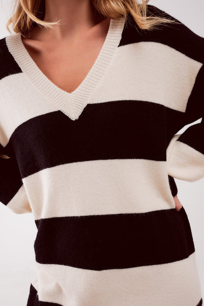 Vestido color crema y negro estilo jersey a rayas