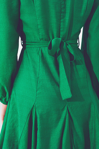 Vestido con volantes y escote en V en verde