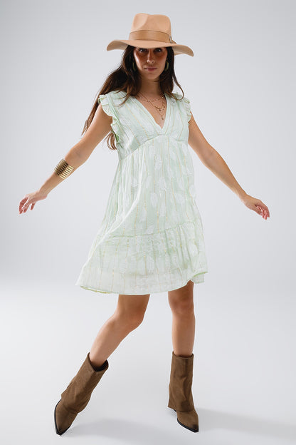 Vestido corto con estampado de hojas e hilo de lúrex en color menta