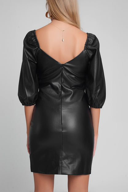 Vestido corto con mangas abullonadas de cuero sintético en negro