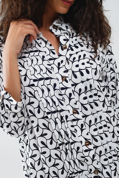 Vestido de manga larga con cuello de polo y estampado abstracto