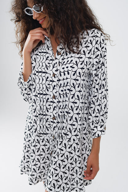 Vestido de manga larga con cuello de polo y estampado abstracto
