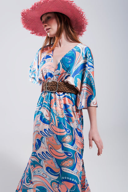 Vestido largo azul con detalles fruncidos en la cintura y lazada en la espalda