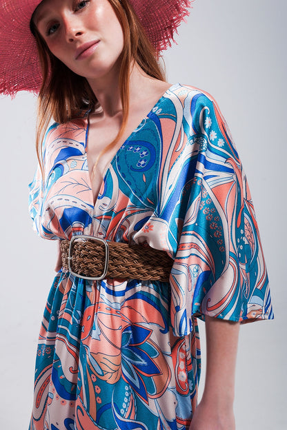 Vestido largo azul con detalles fruncidos en la cintura y lazada en la espalda