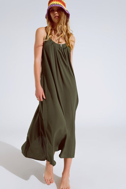 Vestido largo caqui fluido con tirantes y detalles de cuentas