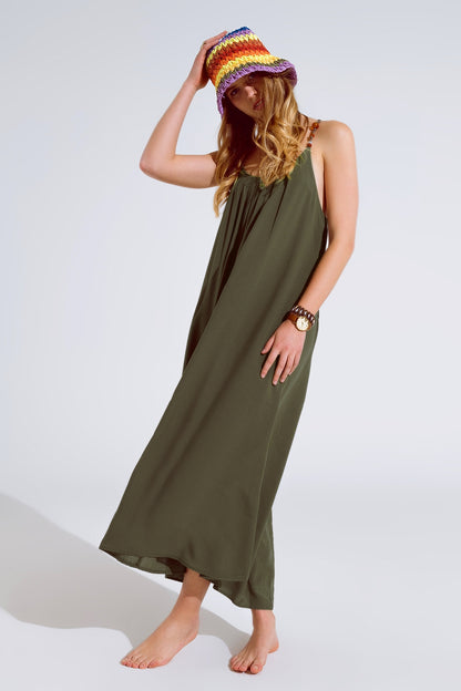 Vestido largo caqui fluido con tirantes y detalles de cuentas