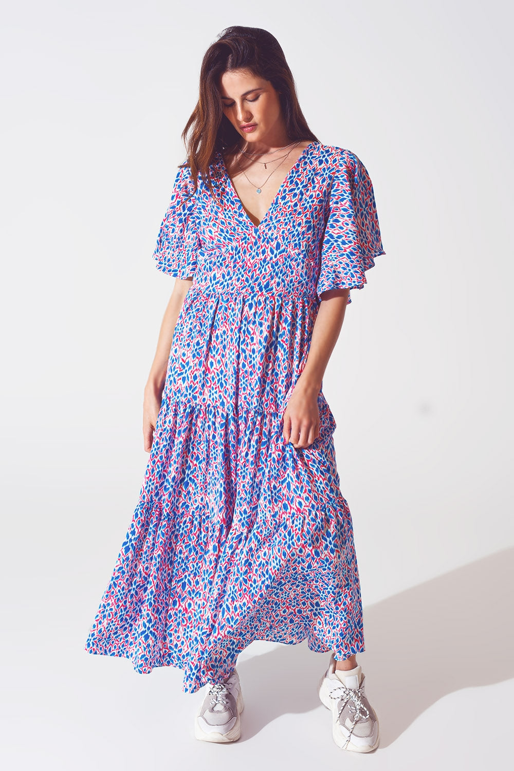 Vestido largo con espalda abierta y lazo en estampado morado
