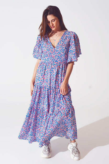 Vestido largo con espalda abierta y lazo en estampado morado