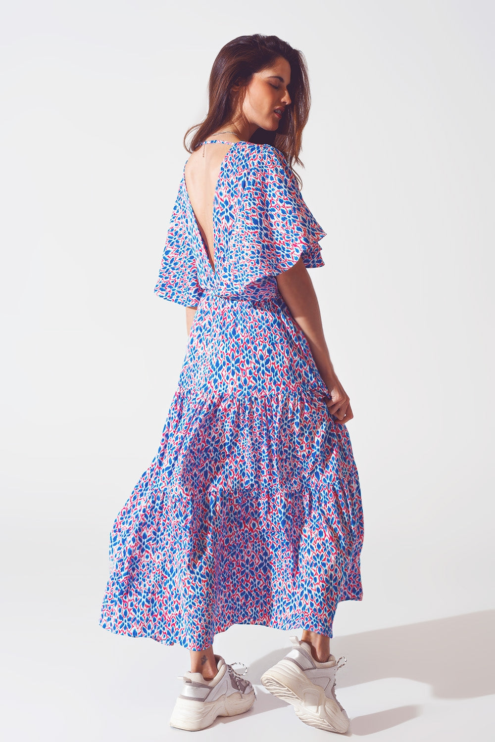Vestido largo con espalda abierta y lazo en estampado morado