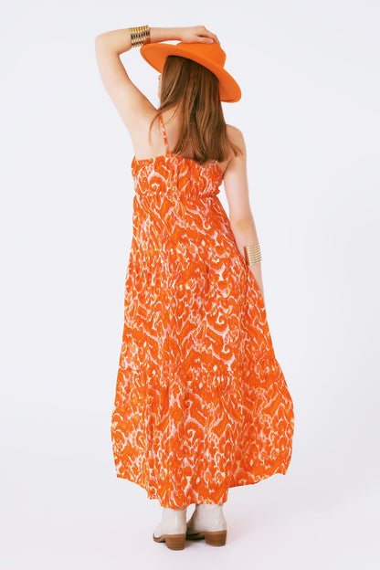 Vestido largo con estampado floral y escote en V en naranja