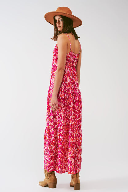 Vestido largo con estampado floral y escote en V en rosa