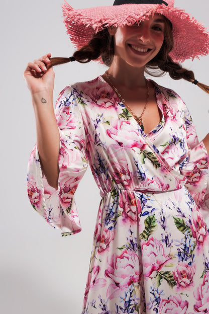 Vestido largo con estampado floral y mangas con vuelo rosa