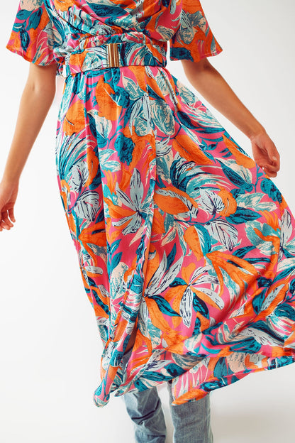 Vestido largo cruzado con estampado floral y cinturón en naranja