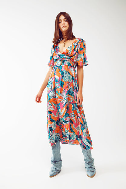 Vestido largo cruzado con estampado floral y cinturón en naranja
