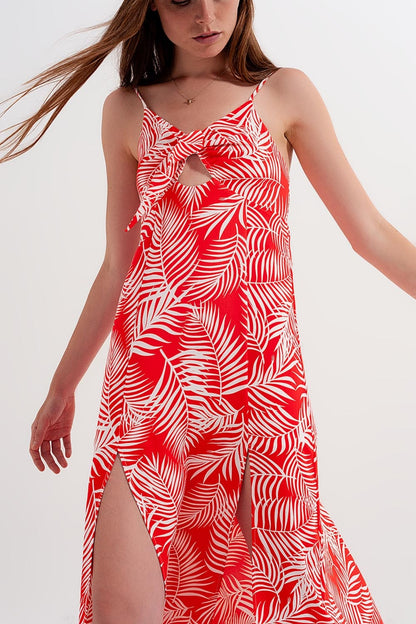 Vestido largo rojo con estampado de hojas y aberturas de A