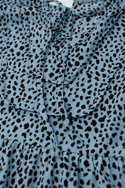 Vestido midi azul con estampado animal negro y mangas largas