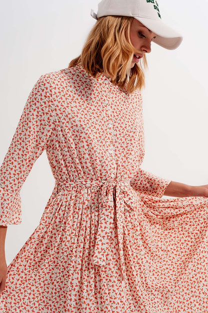 Vestido midi de cuello alto con botones y estampado floral coral