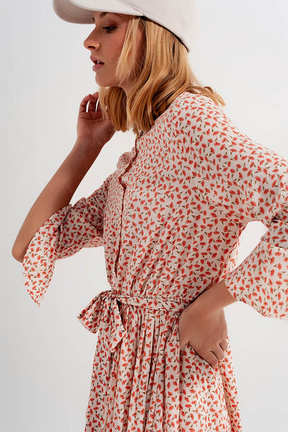 Vestido midi de cuello alto con botones y estampado floral coral