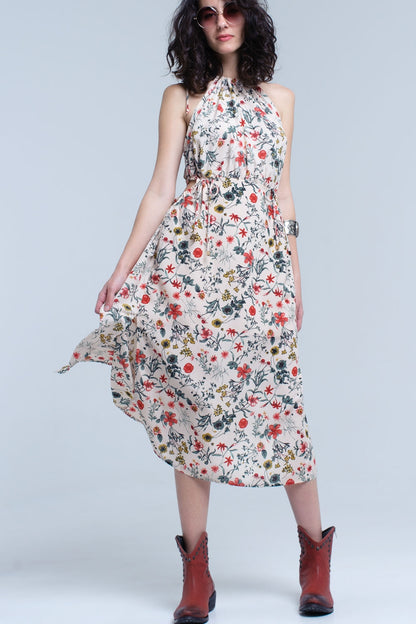 Vestido midi floral beige con cuello alto y aberturas