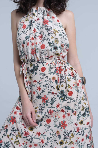 Vestido midi floral beige con cuello alto y aberturas