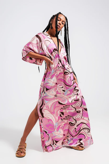 Vestido midi rosa con detalles fruncidos en la cintura y lazada en la espalda