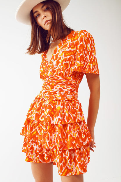 Vestido mini con escote en V y estampado floral en naranja