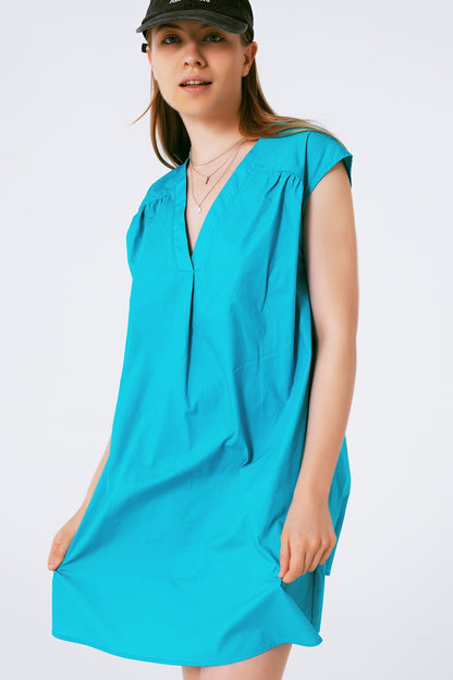 Vestido mini de popelina sin mangas en turquesa