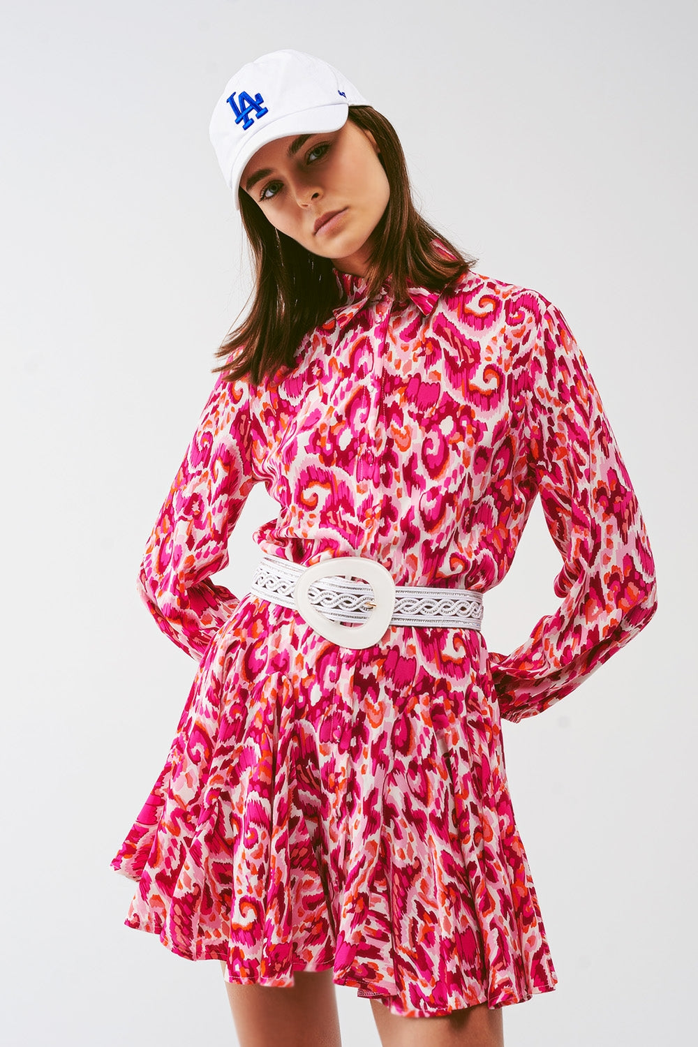 Vestido mini plisado de estampado floral en rosa