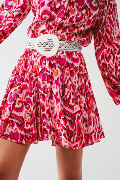 Vestido mini plisado de estampado floral en rosa