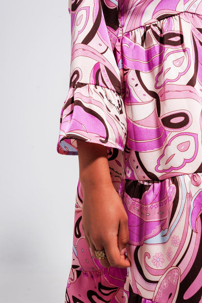 Vestido rosa de corte amplio con mangas tres cuartos