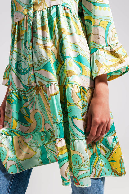 Vestido verde de corte amplio con mangas tres cuartos