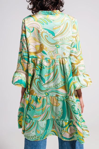 Vestido verde de corte amplio con mangas tres cuartos