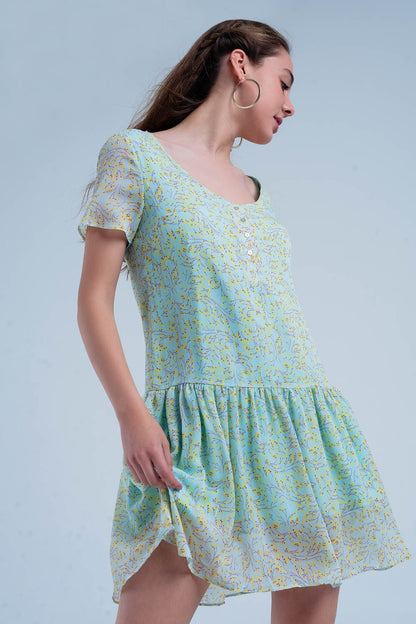 Vestido verde estampado con falda plisada